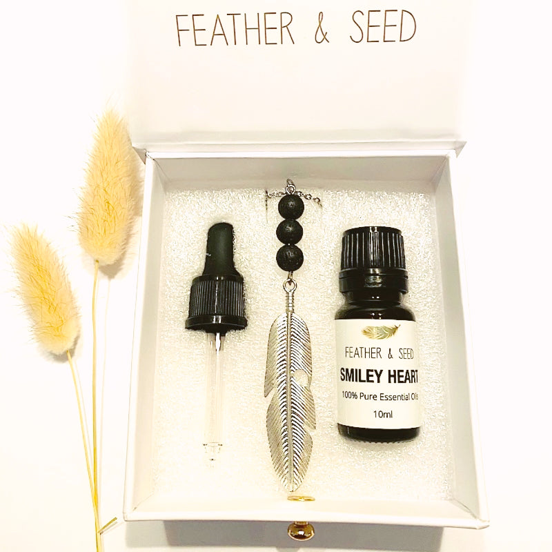 FEATHER & LAVA STONE SILVER NECKLACE WITH ESSENTIAL OIL - Lightness & Spirituality - Feather & Seed